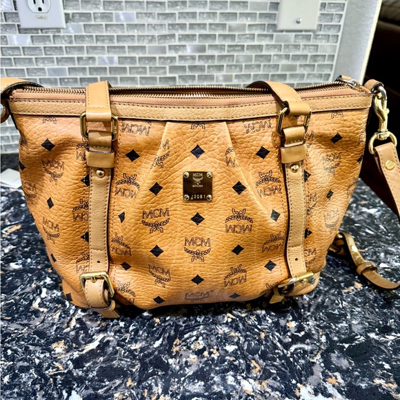 MCM Handbags - MCM Cognac Visetos Monogram Shoulder Bag with Gold Plaque